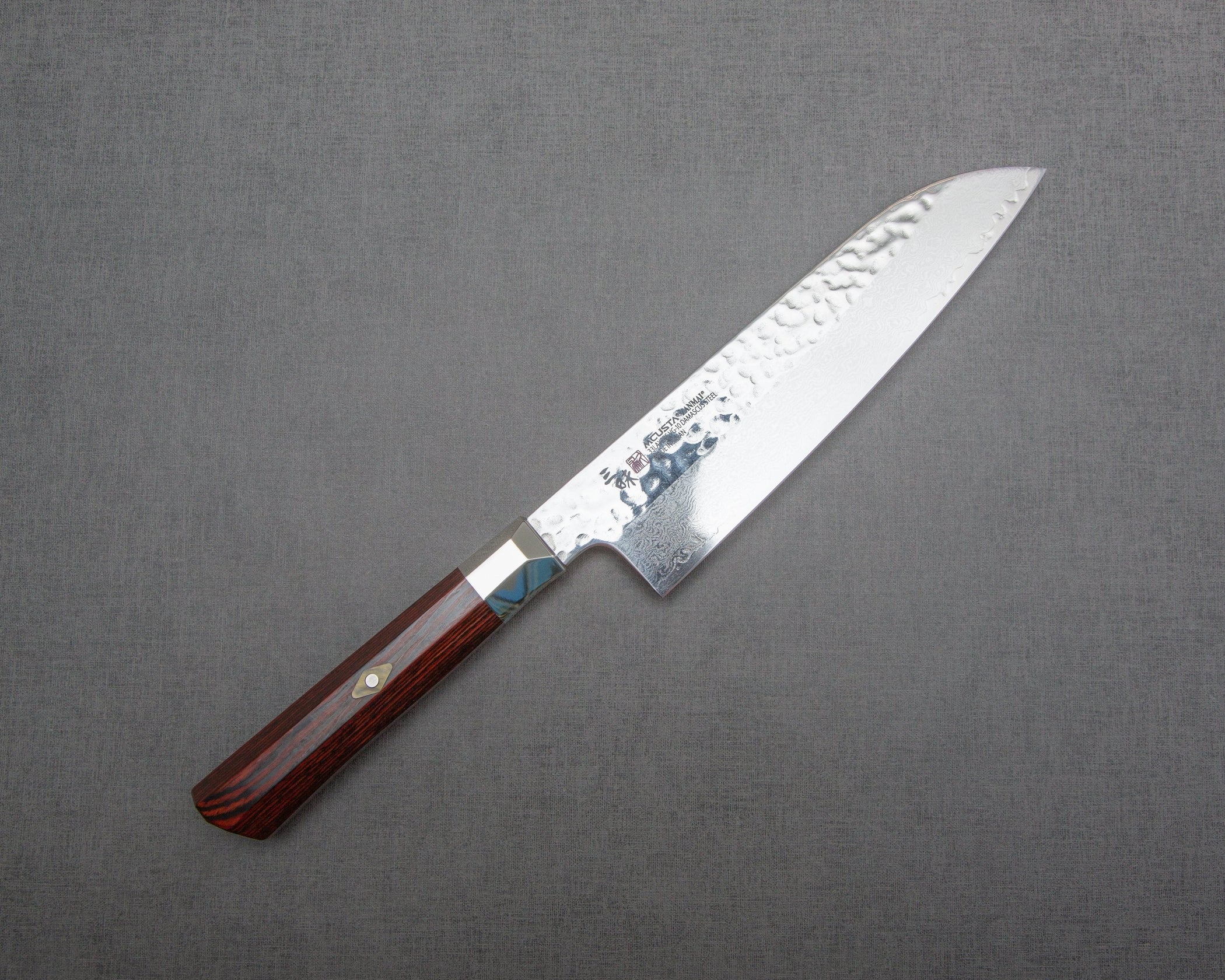 Mcusta Zanmai "Supreme Hammered" Mirror Damascus 180mm Santoku